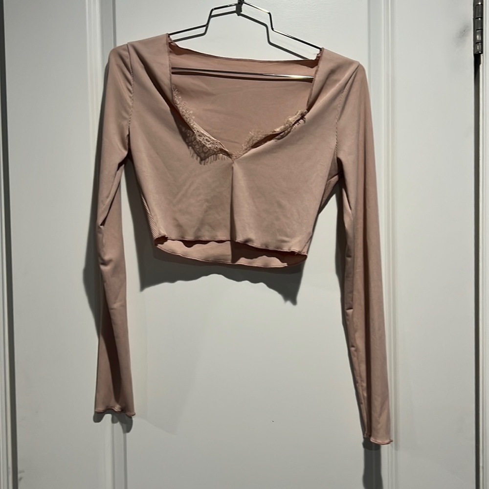 Shein. Long sleeve top. Lace front. Size small. NWOT.